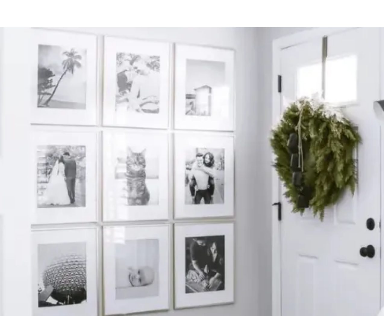 GALLERY WALLNEXT TO A DOOR WITH A WINTER WREATH. FOUND ONLINE